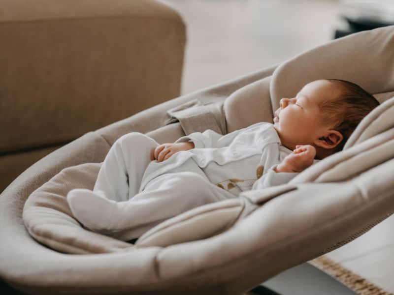 photo: baby in baby swing